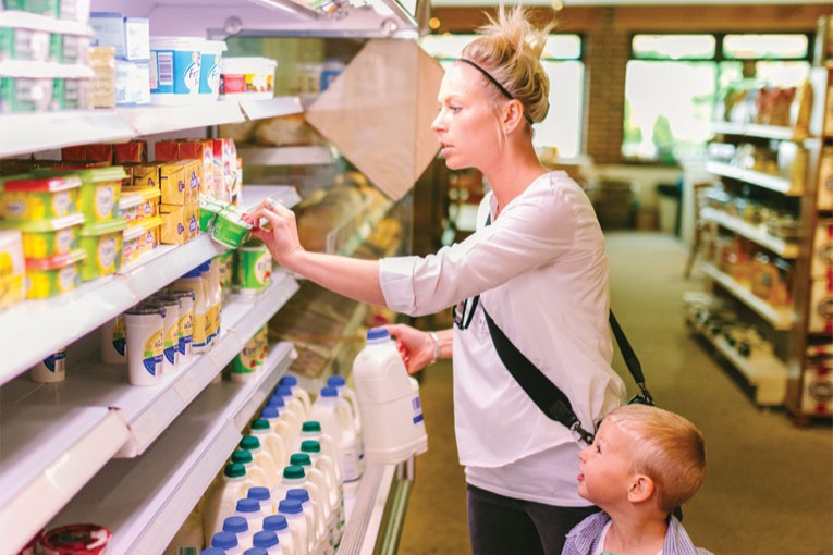 supermarket consumer behavior woman female child boy milk dairy fixed
